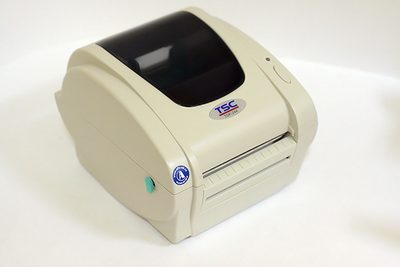 Принтер этикеток TSC TDP-244 UT (с отделителем) — фото 1